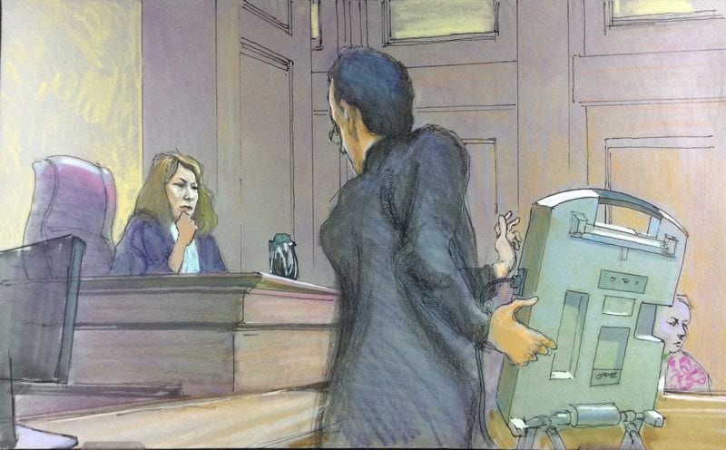 U.S. District Judge Amy Totenberg listened in a federal court hearing in September 2018 as Alex Halderman, a University of Michigan computer science professor, demonstrates how an electronic voting machine like those used in Georgia could be hacked. Totenberg is overseeing a lawsuit that asked her to invalidate Georgia’s 27,000 touchscreen voting machines and replace them with paper ballots. RICHARD MILLER / CONTRIBUTED
