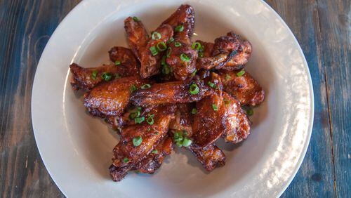 Football fans can score big with 50, 100 or 250 wings at Sweet Auburn BBQ. HANDOUT / Blue Hominy Public Relations.