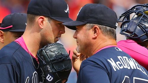 Braves starting pitcher Alex Wood gets a visit on the mound from pitching coach Roger McDowell in the 7th inning against the Nationals during a baseball game on Sunday, May 10, 2015, at Nationals Park in Washington, D.C. Curtis Compton / ccompton@ajc.com