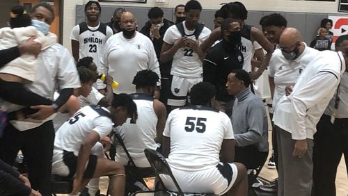 Coach Kim Rivers talks to his team during a timeout in the game against Buford on Jan. 18, 2022. No. 3 Shiloh won the game 53-43 in Snellville.