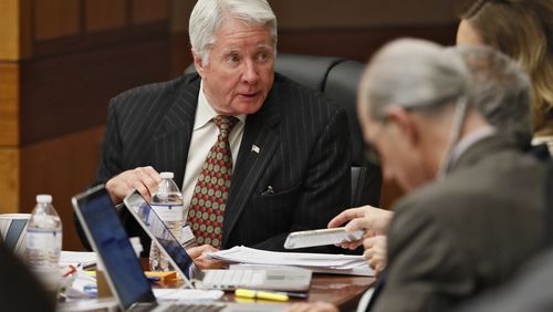 4/16/18 - Atlanta - Tex McIver speaks with his attorneys during his murder trial at the Fulton County Courthouse on Thursday, April 12, 2018. Bob Andres bandres@ajc.com