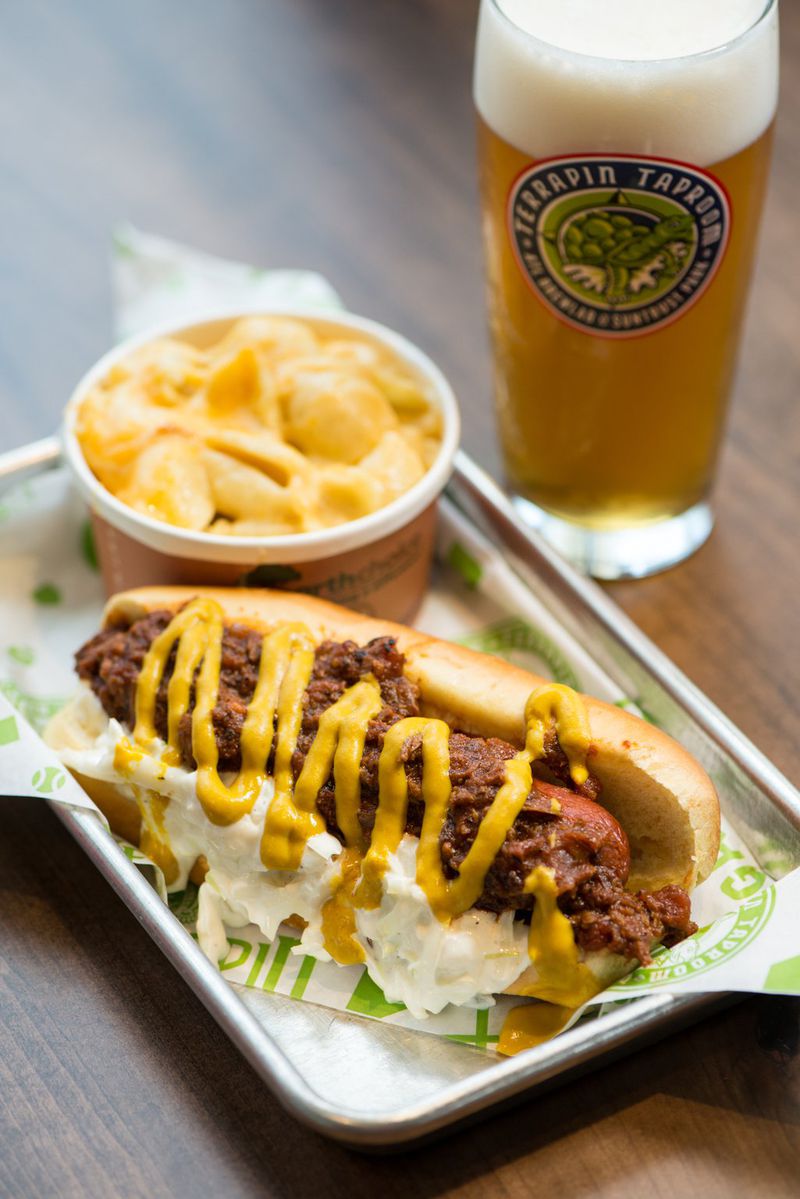 The Terrapin Taproom’s food offerings include the Fox Bros. Dog with Brisket Chili, slaw, mustard, and side of mac and cheese. CONTRIBUTED BY MIA YAKEL