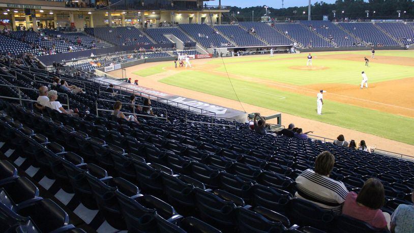 A few fans show up for the Gwinnett Stripers game against the Louisville Bats in a minor league baseball game at Coolray Field on Monday, August 13, 2018, in Lawrenceville. JENNA EASON / JENNA.EASON@COXINC.COM
