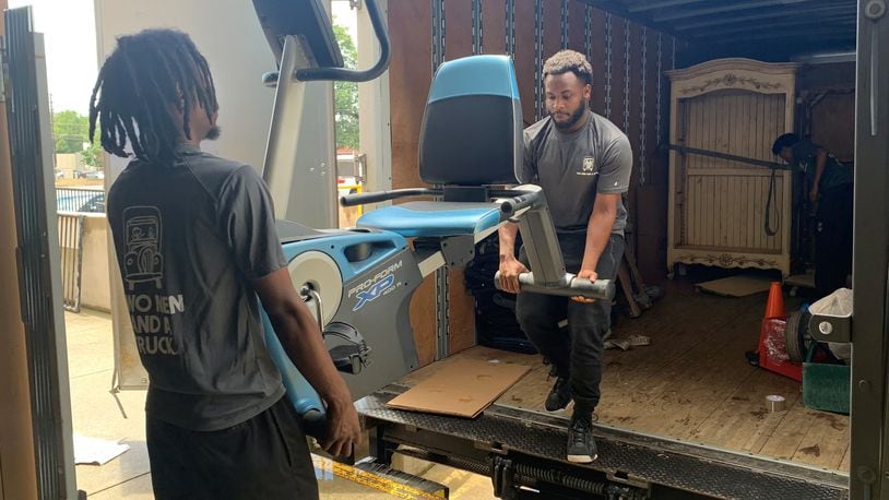 The Two Men and a Truck moving company volunteers equipment, manpower and supplies to area nonprofits.