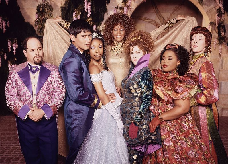 The diverse cast of “Cinderella,” from left: Jason Alexander, Paolo Montalban, Brandy Norwood, Whitney Houston, Bernadette Peters, Natalie Desselle Reid and Veanne Cox.
(Disney+)
