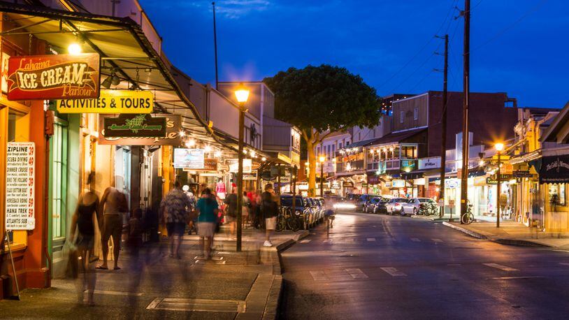 In downtown Lahaina on Maui, Front Street comes alive at night with shoppers and diners in almost any kind of weather. (Tor Johnson/Hawaii Tourism Authority/TNS)