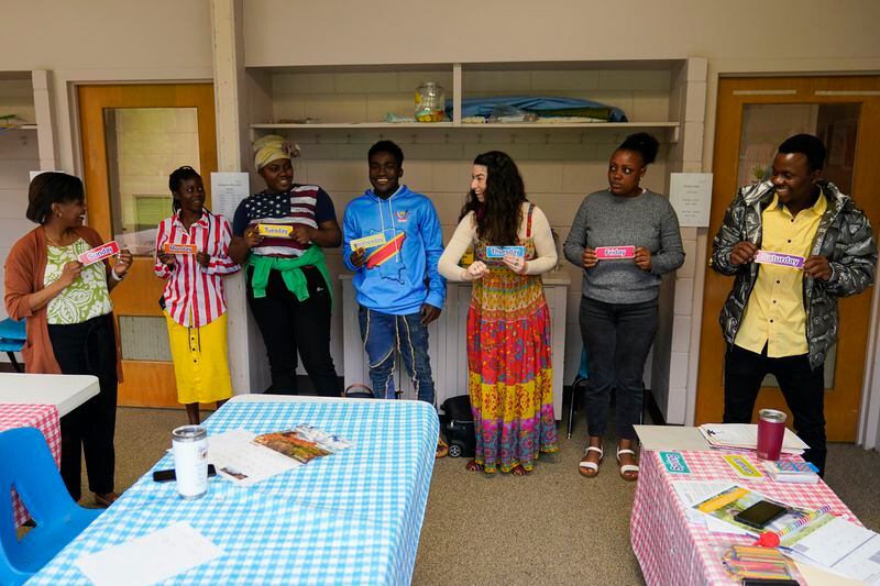 Refugees who recently arrived from Congo and Honduras participate in an English class, Thursday, April 11, 2024, in Columbia, S.C. The American refugee program, which long served as a haven for people fleeing violence around the world, is rebounding from years of dwindling arrivals under former President Donald Trump. The Biden administration has worked to restaff refugee resettlement agencies and streamline the process of vetting and placing people in America. (AP Photo/Erik Verduzco)
