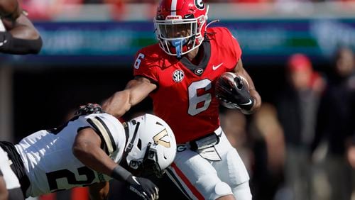 Georgia senior running back Kenny McIntosh’s roots lie in Florida, but he’ll look to defeat the Gators in their yearly matchup in Jacksonville. (Jason Getz/Atlanta Journal-Constitution/TNS)