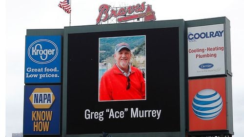 ATLANTA, GA - AUGUST 30: An American flag is lowered to half-staff in memory of a fan, Greg "Ace" Murrey, who fell to his death at the game between the Atlanta Braves and the New York Yankees on August 29, 2015, at Turner Field on August 30, 2015 in Atlanta, Georgia. (Photo by Kevin C. Cox/Getty Images)
