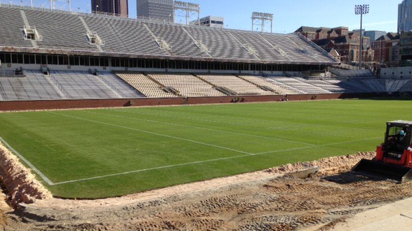 The artificial turf perimeter of Grant Field has been removed to make way for the installation of natural grass. (AJC photo by Ken Sugiura)