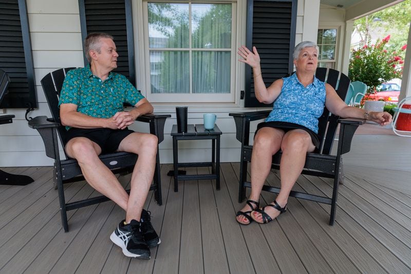Evan and Susan Stitt were among a handful of families that lived in the walled-off area adjacent to downtown Senoia that served as "Alexandria" on "The Walking Dead." Arvin Temkar/arvin.temkar@ajc.com 