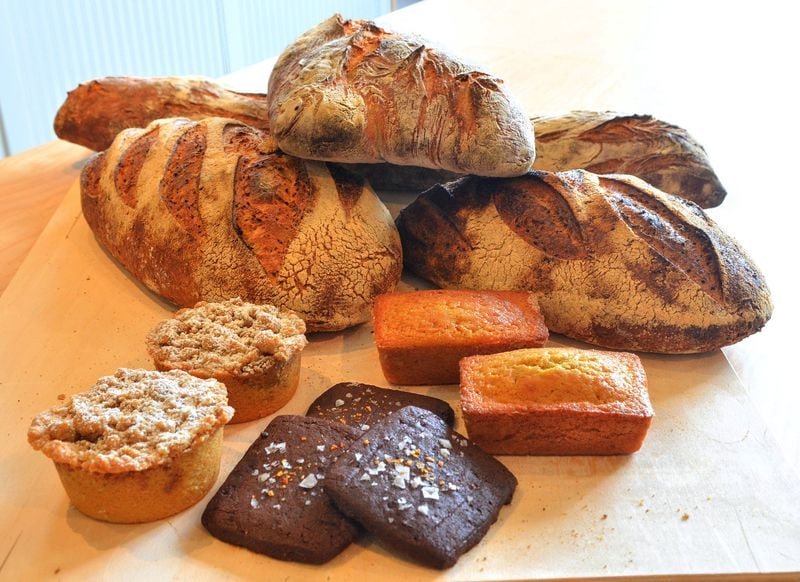 A few of the offerings from Root Baking Co. (clockwise from center bottom): chocolate-citrus shortbread, kefir coffee cake, grit bread, sweet corn financier. CONTRIBUTED BY CHRIS HUNT / SPECIAL