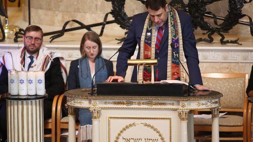 Rabbi Peter Berg speaks during a prayer vigil for the victims of the Pittsburgh synagogue deadly shooting at The Temple on Tuesday, October 30, 2018, in Atlanta. The Temple hosted an interfaith prayer vigil in conjunction with Outcry. (Photo: JASON GETZ/SPECIAL TO THE AJC)