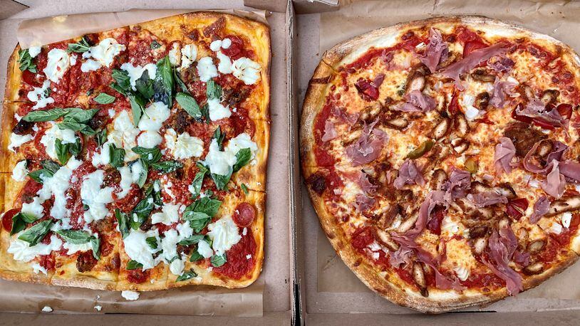 Among the takeout pies available at O4W Pizza in Duluth are the Spicy Italian (left) and the Jersey Shore. Wendell Brock for The Atlanta Journal-Constitution
