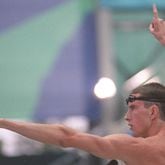 American swimmer Tom Dolan celebrates his gold medal win in the 400m medley, Sunday night, July 21, 1996, at the Georgia Tech Aquatics Center during the 1996 Summer Olympic Games in Atlanta,. (David Tulis/AJC)