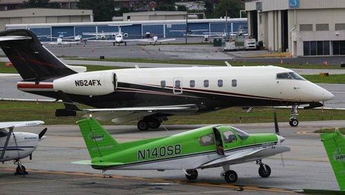 The airport houses a number of corporate jets. AJC file photo