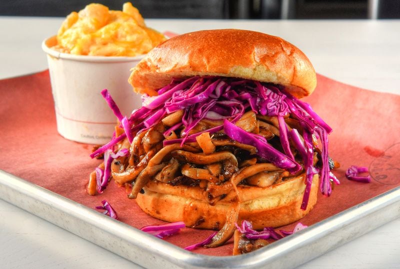 Fox Bros. has a vegetarian option in the Pulled Mushroom sandwich (smoked oyster mushrooms, barbecue sauce, vinegar slaw, brioche bun). (Chris Hunt for The Atlanta Journal-Constitution)