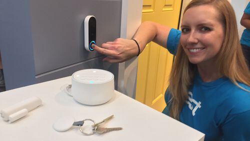 Nest program manager Aubrey Thelen demonstrates the company’s new “Nest Hello” video doorbell, with components of the new Nest security system in the foreground. (Ethan Baron/Bay Area News Group/TNS)