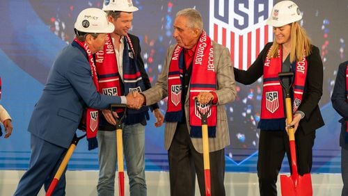 Governor Brian Kemp (R) shakes hands with Arthur M. Blank during the ground breaking of the Arthur M. Blank U.S. Soccer National Training Center on Monday, April 8, 2024, in Atlanta, at State Farm Arena. (Atlanta Journal-Constitution/Jason Allen)