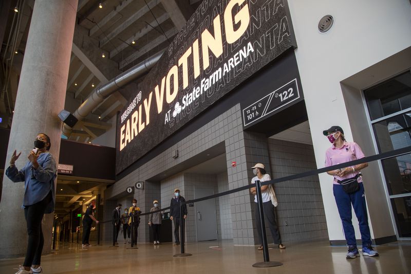 State Farm Arena held early voting for Fulton County residents in October. The site was donated privately, which will no longer be allowed by the new voting law. Senate Bill 202 states that county election officials are prohibited from accepting any funding or gifts, except from local, state or federal governments. (Alyssa Pointer / Alyssa.Pointer@ajc.com)