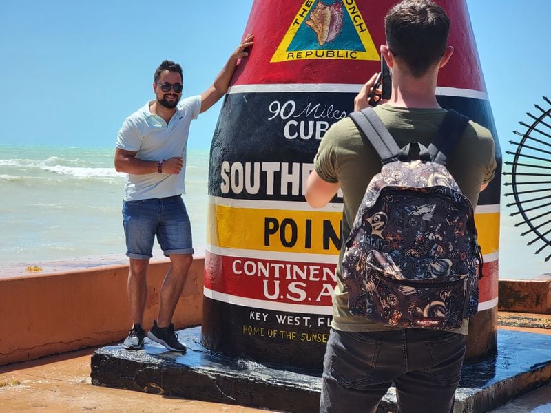 Every year thousands of visitors have their picture taken at the Southernmost Point Buoy in Key West.
(Courtesy of Wesley K.H. Teo)