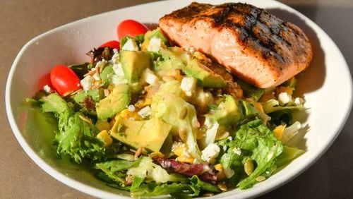Bonefish Grill's Citrus Herb Vinaigrette, shown with the restaurant's Florida Cobb Salad with salmon. (Chris Hunt for The Atlanta Journal-Constitution)