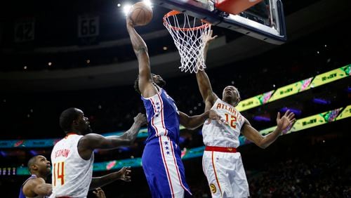 Joel Embiid had 49 points and 14 rebounds Monday as the Sixers throttled the Hawks 129-112 in Philadelphia. (AP Photo/Matt Slocum)