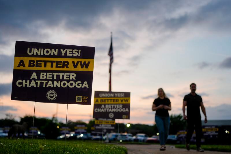 Volkswagen automobile plant employees arrive for a watch party to see the results of their union election Friday, April 19, 2024, in Chattanooga, Tenn. Workers finished voting Friday night on whether to join the United Auto Workers union. (AP Photo/George Walker IV)