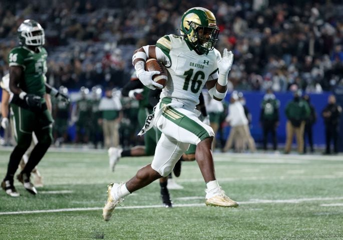 Dec. 30, 2020 - Atlanta, Ga: Grayson running back Jayvian Allen (16) scores a rushing touchdown in the first half against Collins Hill during the Class 7A state high school football final at Center Parc Stadium Wednesday, December 30, 2020 in Atlanta. JASON GETZ FOR THE ATLANTA JOURNAL-CONSTITUTION