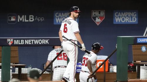 Braves left fielder Charlie Culberson walks off of the field following their 15-3 loss against the Los Angeles Dodgers in Game 3 Wednesday, Oct. 14, 2020, for the best-of-seven National League Championship Series at Globe Life Field in Arlington, Texas. (Curtis Compton / Curtis.Compton@ajc.com)