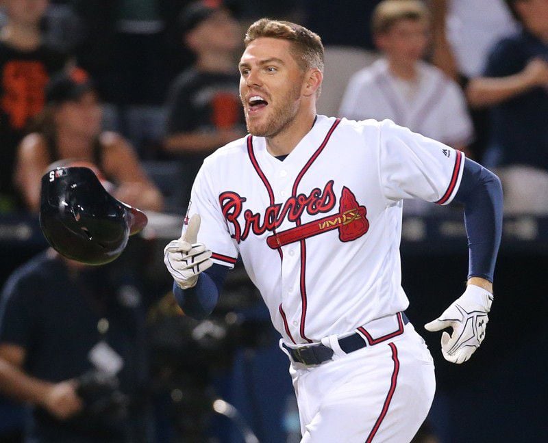  Freddie Freeman is the Braves' franchise player, and he's setting an example of a "team guy" with his selfless willingness to move to third base. (Curtis Compton/AJC)