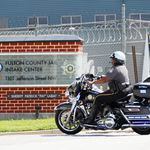 A police motorcycle is seen entering the Fulton County Jail in Atlanta on Thursday, Aug. 16, 2023. (Miguel Martinez/AJC)