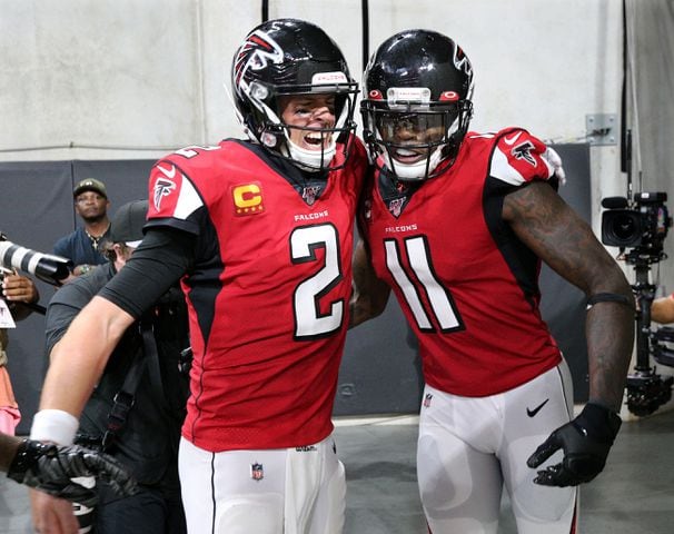Photos: Falcons outlast Eagles for first win