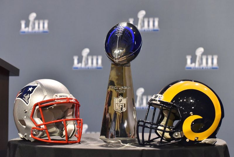 Championship trophy and helmets are displayed during NFL Commissioner Roger Goodell’s press conference at Super Bowl LIII Media Center inside Georgia World Congress Center. The logos are among those protected by the NFL. HYOSUB SHIN / HSHIN@AJC.COM