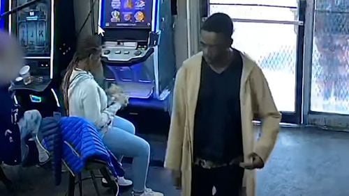 Atlanta police are requesting the public's assistance in identifying the man in the long, tan coat, who is a person of interest in a recent homicide case.