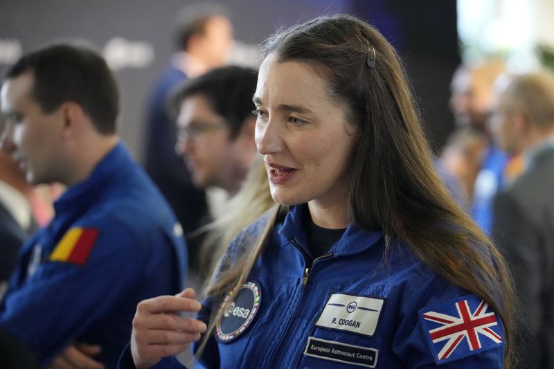 Astronaut Rosemary Coogan of Britain speaks during the candidates of the Class of 2022 graduation ceremony at the European Astronaut Centre in Cologne, Germany, Monday, April 22, 2024. ESA astronaut candidates Sophie Adenot of France, Pablo Alvarez Fernandez of Spain, Rosemary Coogan of Britain, Raphael Liegeois of Belgium and Marco Sieber of Switzerland took up duty at the European Astronaut Centre one year ago to be trained to the highest level of standards as specified by the International Space Station partners. Also concluding a year of astronaut basic training is Australian astronaut candidate Katherine Bennell-Pegg, who has trained alongside ESA's candidates. (AP Photo/Martin Meissner)