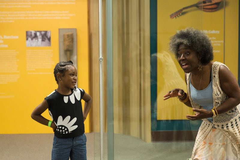 At the Atlanta History Center’s Fall Folklife Festival, Atlanta storyteller Mama Koku shares interactive Southern folk stories. JASON HALES/ATLANTA HISTORY CENTER