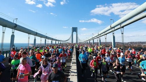 Running a marathon — such as this one in New York City last November — is a fine endeavor, but sometimes we focus too much on physical health and not enough on traits like being humble and kind, columnist Lorraine Murray says. MICHAEL REAVES / GETTY IMAGES