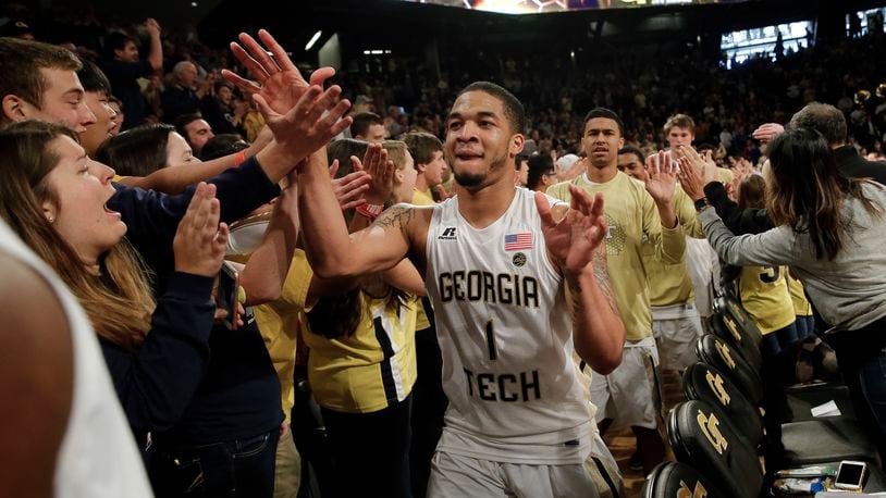 Georgia Tech guard Tadric Jackson (1) celebrates with fans after defeating Notre Dame 62-60 in an NCAA college basketball game Saturday, Jan. 28, 2017, in Atlanta. (AP Photo/John Bazemore)
