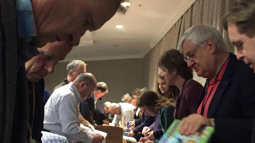 The Rotary Club of Dunwoody gave 1,800 DeKalb County students books at a recent event.