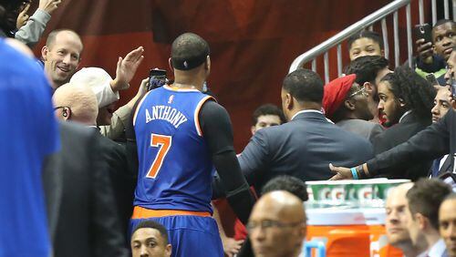 Knicks forward Carmelo Anthony leaves the court after he was charged a flagrant foul 2 against Hawks guard Thabo Sefolosha and ejected from the NBA basketball game on Wednesday, Dec. 28, 2016, in Atlanta. Curtis Compton/ccompton@ajc.com