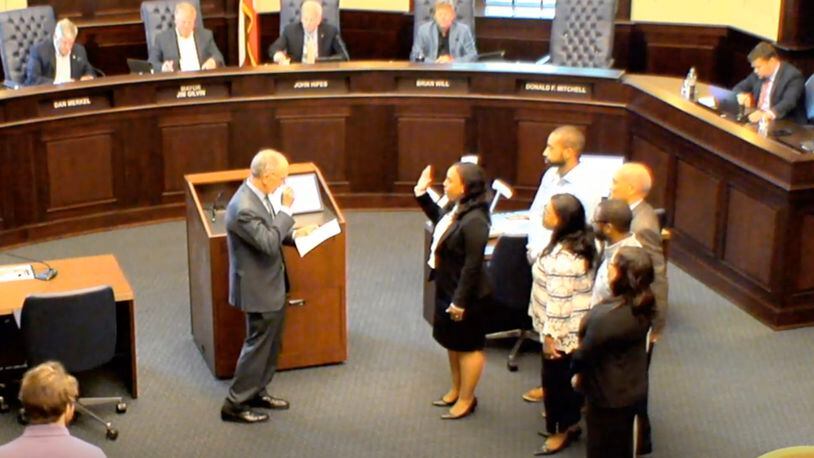 With her family in attendance Kelsie Mattox was recently sworn in to serve as Alpharetta & Milton's City Solicitor. (Courtesy City of Alpharetta)