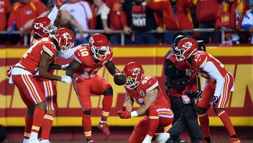 The Kansas City Chiefs break into an endzone act after a touchdown earlier this season. (Peter Aiken/Getty Images)