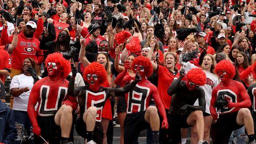 Georgia football fans cheer before the G-Day game at Sanford Stadium Saturday, April 16, 2022, in Athens.  Today's Sports Insider takes a closer look inside college sports. (Jason Getz / Jason.Getz@ajc.com)