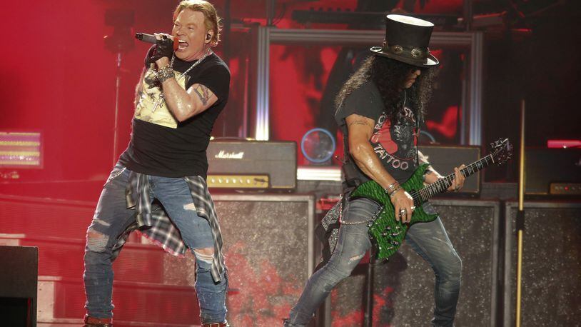 Guns N' Roses' Axl Rose, left, and Slash perform on the first weekend of the Austin City Limits Music Festival at Zilker Park on Friday, Oct. 4, 2019, in Austin, Texas. (Photo by Jack Plunkett/Invision/AP)