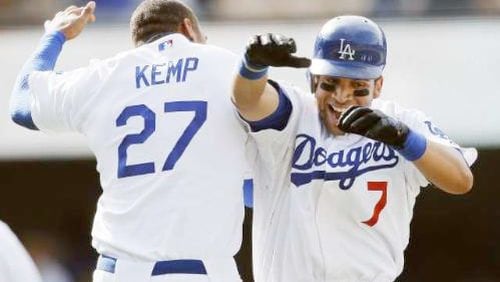 Matt Kemp and first baseman James Loney were Dodgers teammates for six seasons through 2011. They could soon be Braves teammates after Loney signed a minor league deal Thursday. (AP file photo)