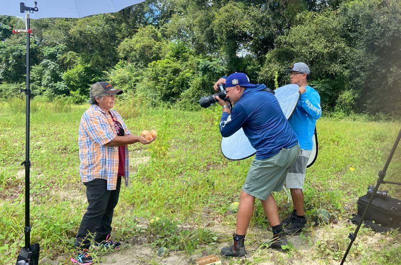 Hector Amador and Miguel Martinez work on "Our Essential Heroes," a video and photo project that celebrates Hispanic essential workers. (Courtesy of Miguel Martinez)