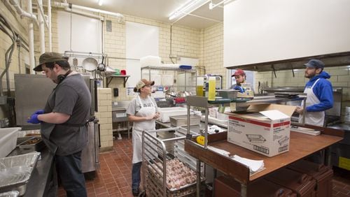 The school’s nutrition team works out of the kitchen at the middle school building in Ormewood Park. Meals are prepped there, then either served in the middle school cafeteria or delivered to the elementary school campus in Grant Park. Photo: Kelley Klein