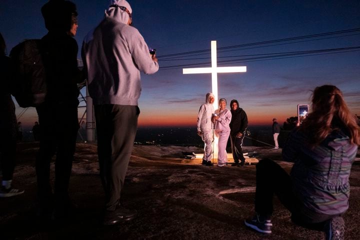 Allison Glover, from left, Chalynne Bryant and Ellen Bryant pose for a photo before Easter sunrise service on top of Stone Mountain on Sunday, March 31, 2024.   (Ben Gray / Ben@BenGray.com)
