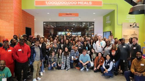 Atlanta Community Food Bank President and CEO Kyle Waide and team celebrate under the ticker when the organization served its one billionth meal since its inception in 1979. (Courtesy of Viviana Fonseca)